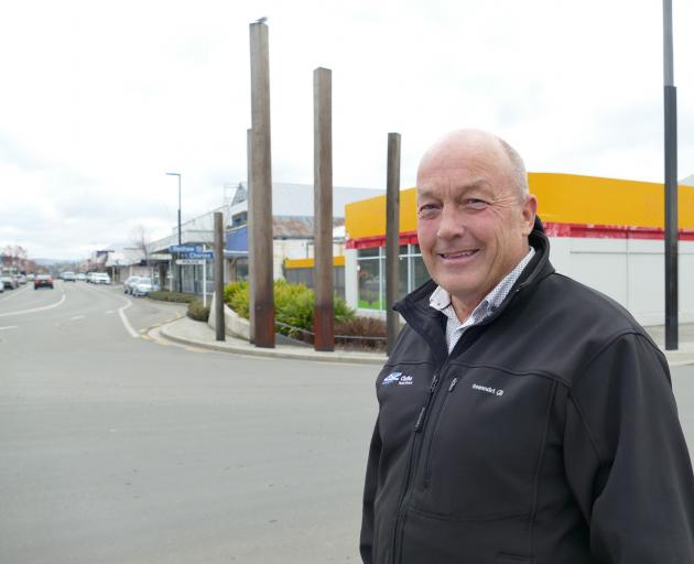 Bittersweet ... Clutha Mayor Bryan Cadogan stands in front of the proposed site of a new...
