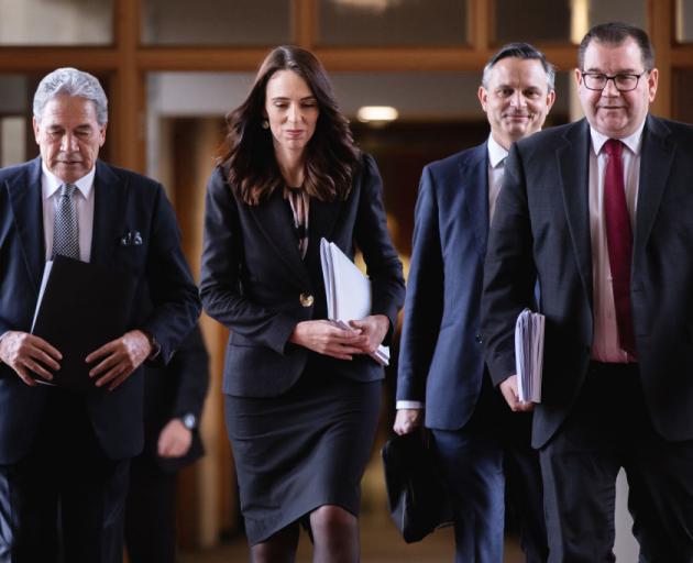 Deputy Prime Minister Winston Peters (from left), Prime Minister Jacinda Ardern, Greens leader...