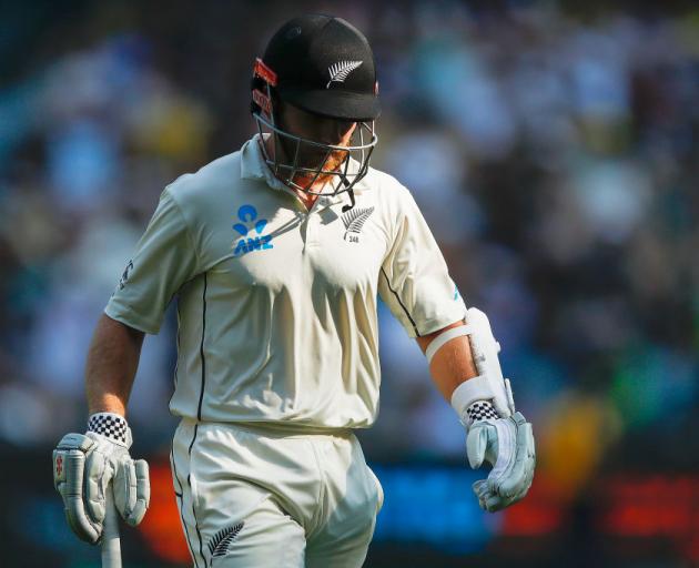 Kane Williamson of New Zealand leaves the field after being dismissed by James Pattinson of...