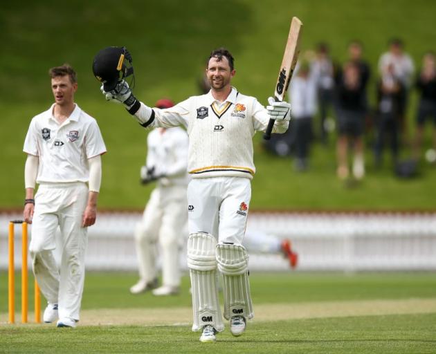 Devon Conway celebrates his triple century for Wellington against Canterbury yesterday. Photo:...