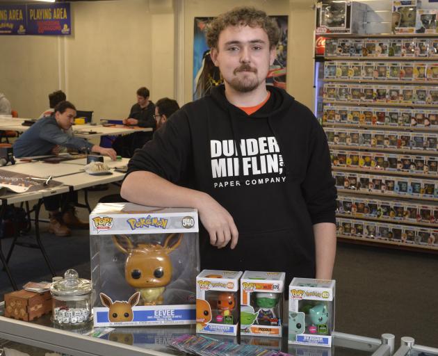 Dice Jar Games owner Greg Mansfield in  his new store at an upstairs space on George St. PHOTO:...