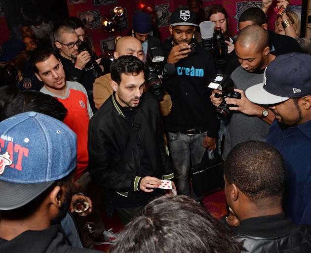 Dynamo performs for a crowd, still hoping to inspire. PHOTO: GETTY IMAGES