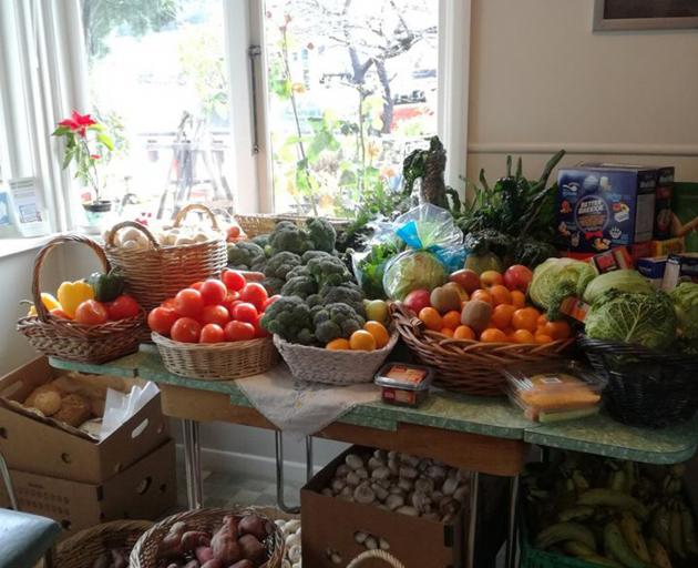 Fruit and vegetables were given away yesterday on "produce day" at Happiness House Queenstown...