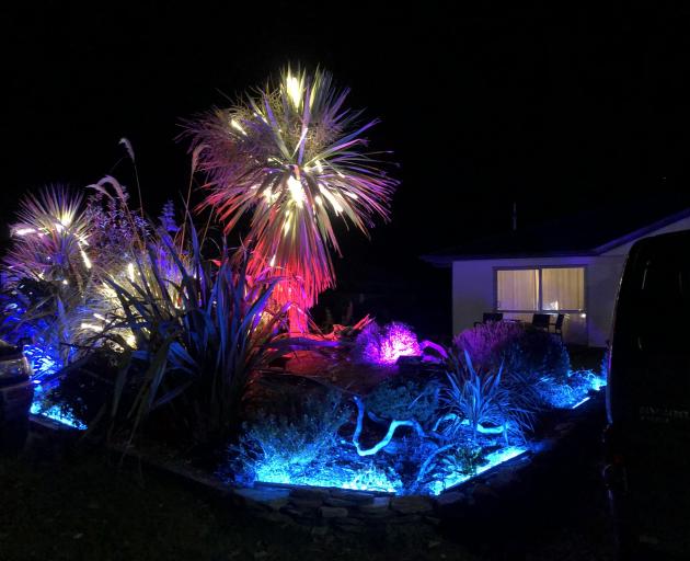 Luma crew member Simon Holden has set up light installations in his front yard in the resort....