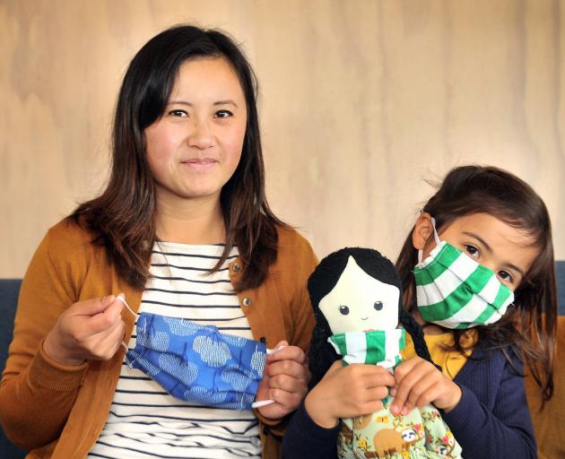Dr Ling Chan, a pathology doctor in Dunedin, and her daughter, Isla Ansell (6), holding her doll...