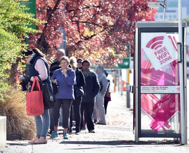 Shoppers queue oustide Countdown Central to do their food shop during the Coronavirus lockdown on...