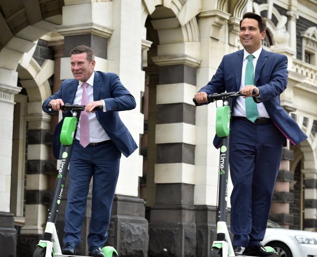 Deposed National Party leader Simon Bridges (right) with Michael Woodhouse go for a ride in...