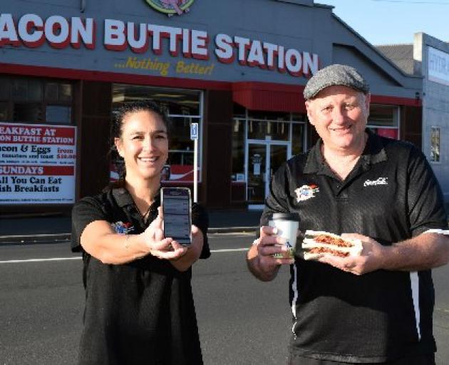 Bacon Butty Station co-owners Tia Winikerei and Mike Cornelissen reopened their eatery in central Dunedin on Tuesday. PHOTO: SHAWN MCAVINUE