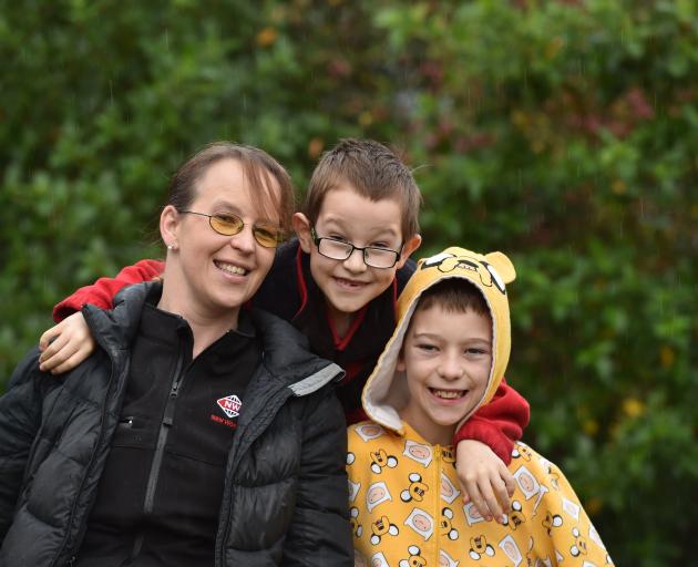 Annette Churchill and sons Daniel Dustow and Braith Dustow, in 2018. PHOTO: PETER MCINTOSH