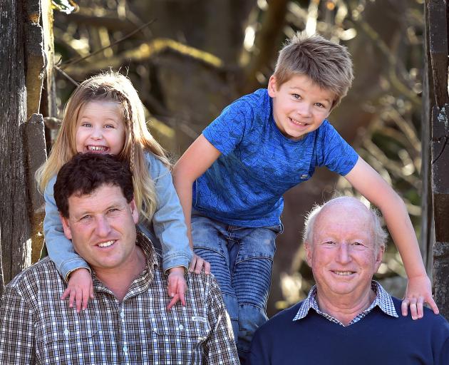 The Bathgate family of (from left) Simon, Ashlee (3), Caleb (8) and Ian, at their Taieri farm. PHOTO: PETER MCINTOSH.