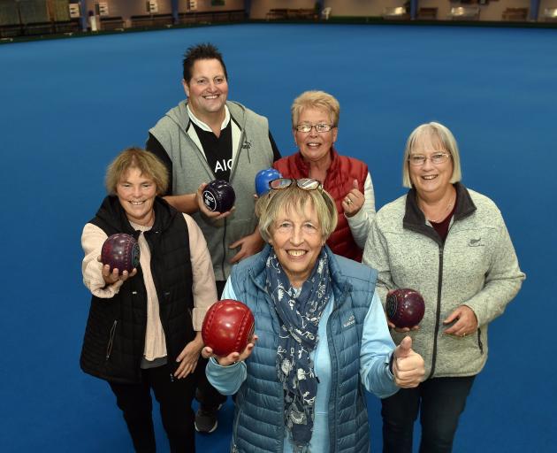 Hands on ... Enjoying some social bowling at the Dunedin Bowls Stadium yesterday are (from left)...