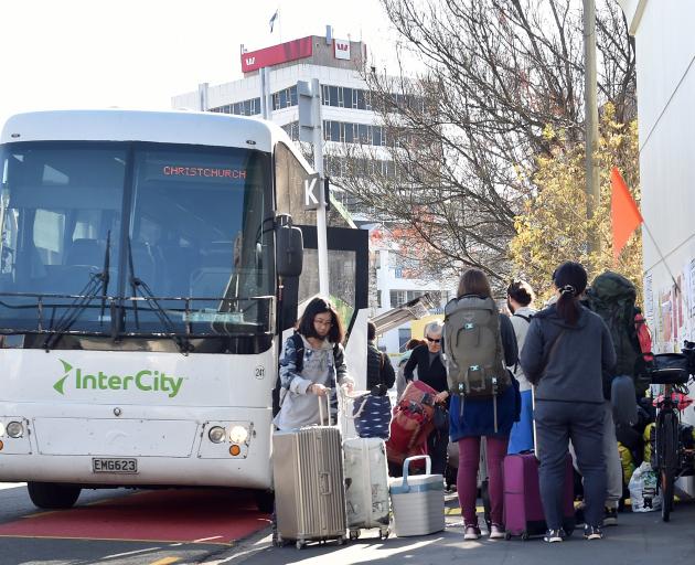 Passengers depart and board the bus from the new InterCity Bus stop at Moray Pl in 2019. PHOTO...