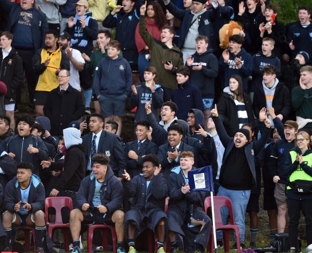 King’s supporters celebrate as their team beats Otago Boys’ for the first time since 2007. 