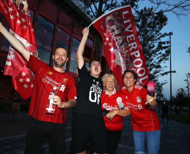 Liverpool fans celebrate clinching the Premier League title. Photo: Getty Images