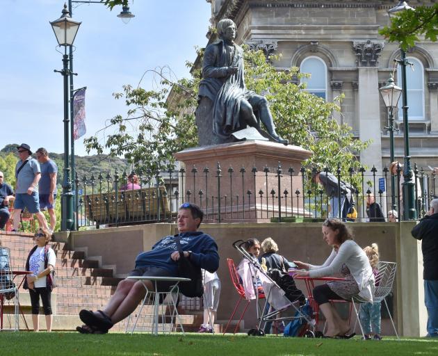 People enjoy a warm day at the Octagon earlier this year. Photo: ODT files