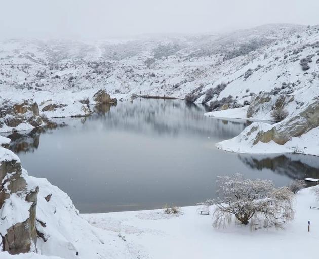 Blue Lake, in St Bathans, surrounded by snow on Saturday.PHOTO: WANDA JAGGARD
