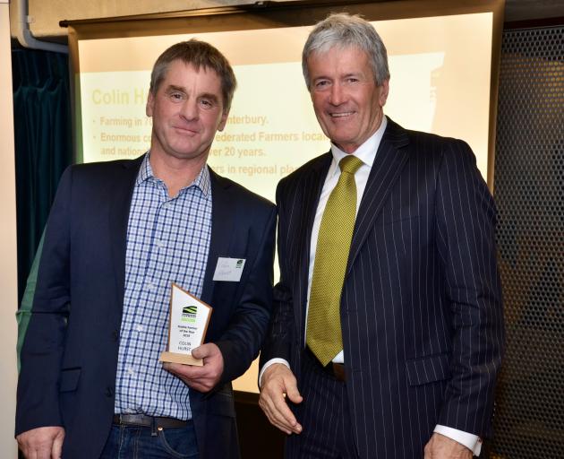 Colin Hurst (left) received his Arable Farmer of the Year award from Agriculture Minister Damien...