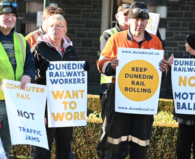 Protesters outside the Dunedin Railway Station. Photo: Craig Baxter