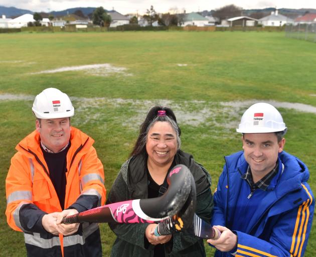 Looking forward to the construction of the hockey turf at King's High School are (from left) King...