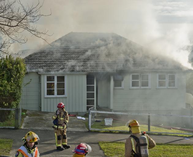 This Corstorphine house was extensively damaged by smoke during a fire yesterday. PHOTO: GERARD O...