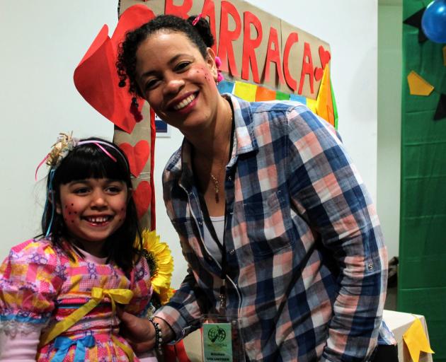 Clara Cascaes and her daughter Heloisa (5) said the best part of the celebration were the...