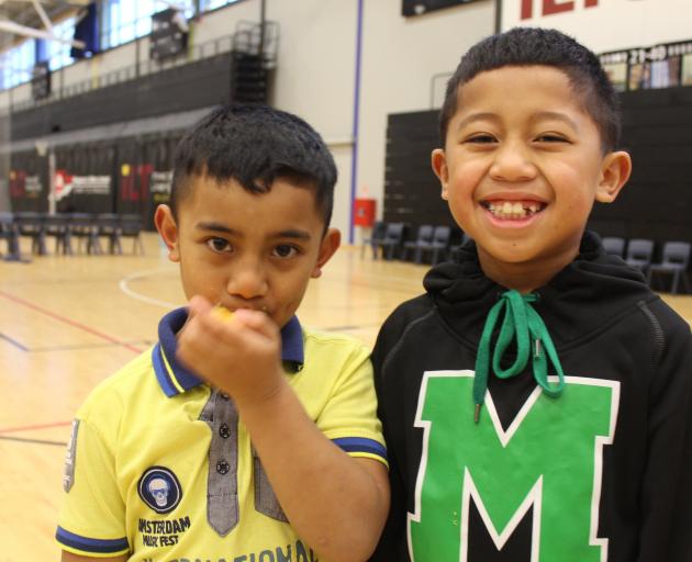Invercargill children Taoa Fiso (7, left) and Ene Molioo (8) at the Pasifika Youth Sports Day at...