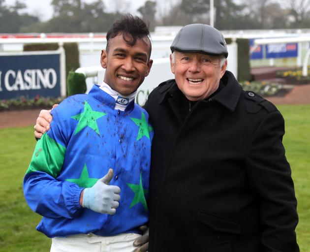 Rohan Mudhoo, who rode a treble of winners at Riccarton, with trainer Mike McCann. Photo: Race...