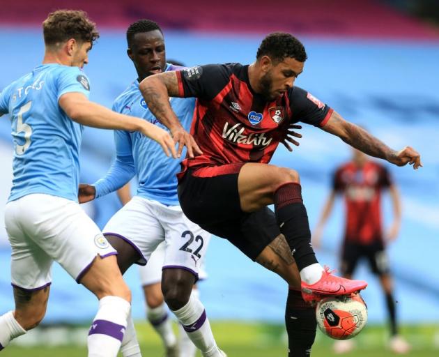 Bournemouth's Joshua King controls the ball against Manchester City this morning. Photo: Getty...