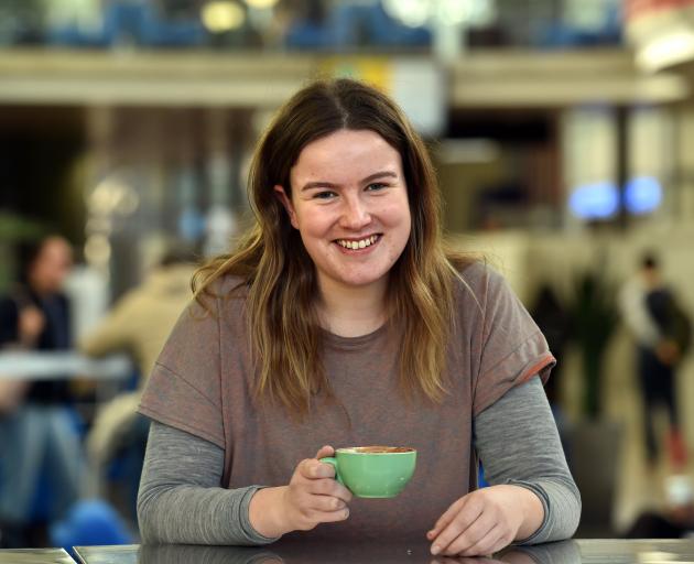 Otago University student Katie Fenton (20) with her coffee on campus yesterday. PHOTO: PETER...