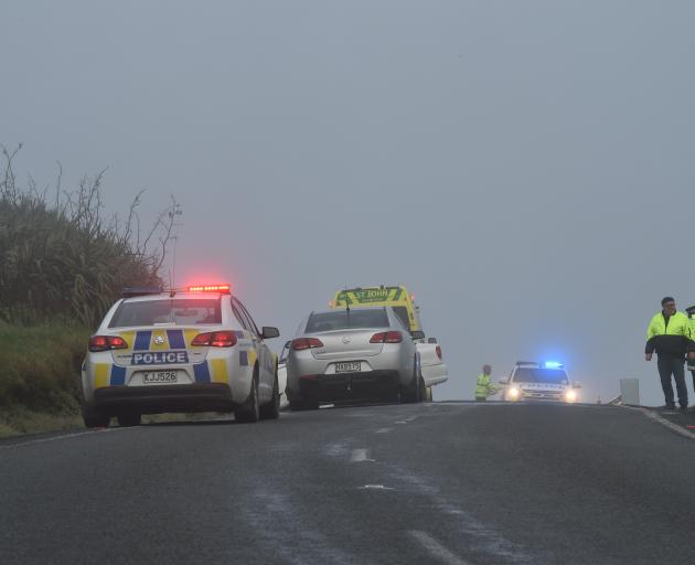 Emergency services attend a car crash on Highcliff Rd. Photo: Gregor Richardson