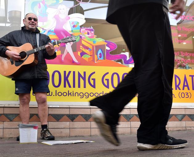 Dunedin busker Jackson Caine may not be able to play in his usual spot in Albion Lane if a...