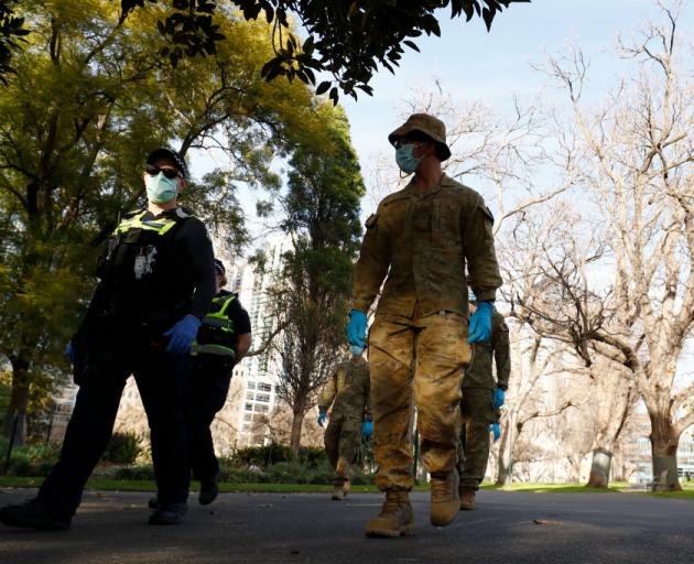 Members of the Australian Defence Force patrol Melbourne streets on Monday. Photo: Getty Images