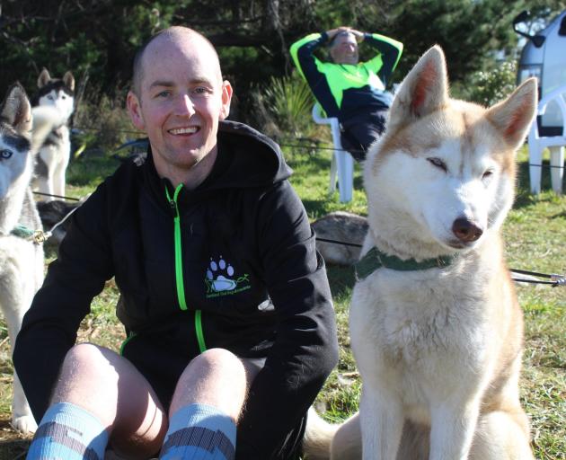 Southland Sled Dog Association member Justin McNally with Nitro (left) and VX at the Fosbender...