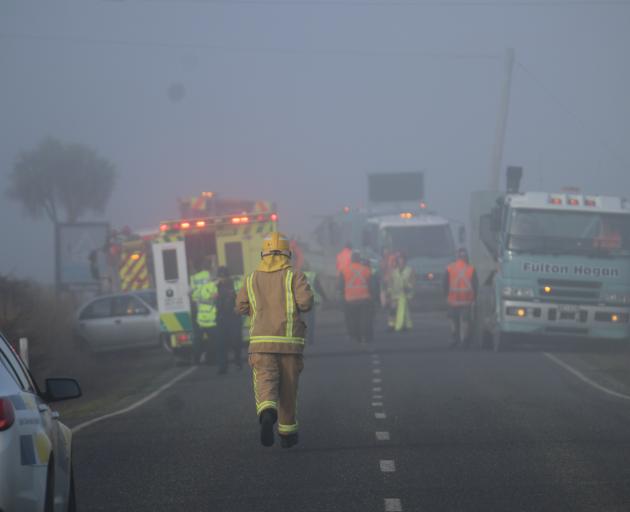 Emergency services were called to a crash where a car collided with a truck in Wyndham yesterday. PHOTO: SANDY EGGLESTON