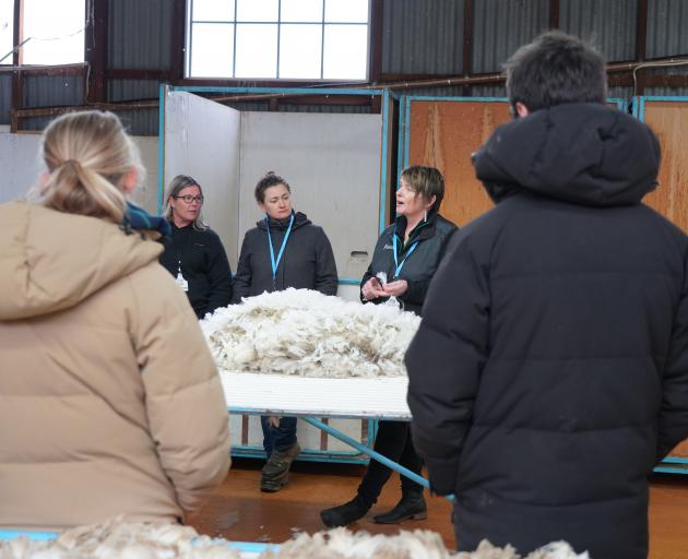 New Zealand Merino Company area manager Katrina Bishop talks fine wool, watched by PGG Wrightson ...