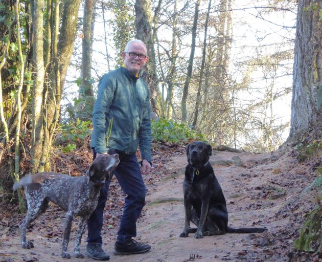 Lawrence resident Quentin Currall walks dogs Tara and Blaze in the town’s domain. PHOTO: QUENTIN...