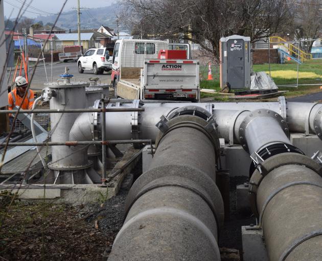 Contractors work on replacing the pumps in the Carlyle Rd pump station, in Mosgiel, last week....