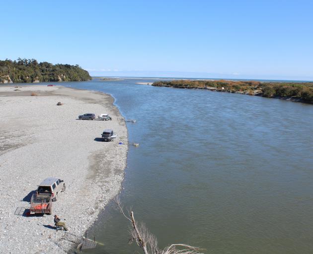 Whitebaiters on the Taramakau River on the West Coast. PHOTO: GREYMOUTH STAR