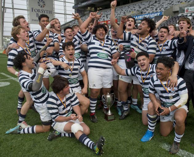 The Otago Boys’ High School first XV celebrates winning the Otago Premier Schools rugby final at...