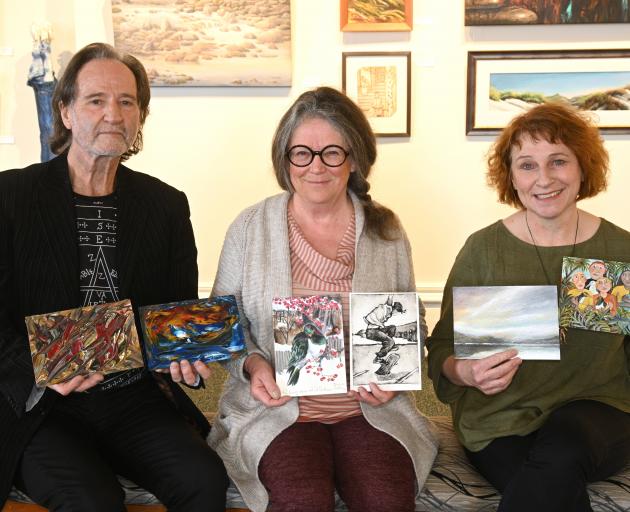 Artists (from left) Roger Weston, Pauline Bellamy and Anne Baldock with some of their work for...