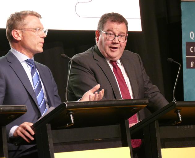 He said what? Labour's Finance Minister Grant Robertson (right) reacts to National's finance...