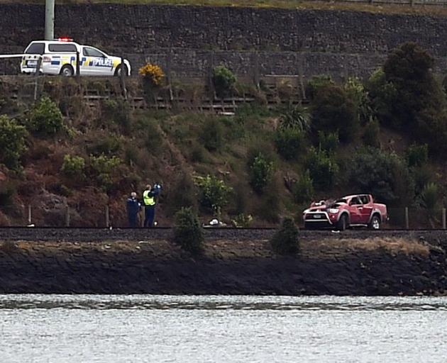 The ute that crashed ended up on railway tracks, which were accessible to emergency services from...