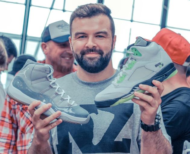 Sean McIntee gets his hands on some Air Jordans at a sneaker swap meet in Auckland. PHOTO: SUPPLIED