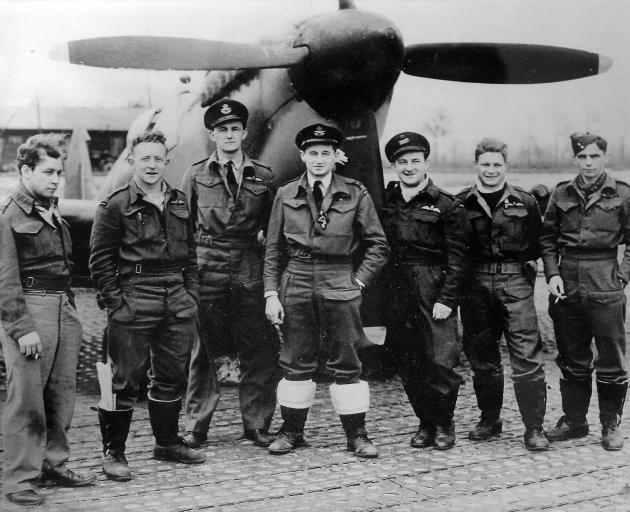 Bill Warwick (third from left) with fellow fighter pilots in his Holland-based Royal Air Force squadron in 1945. Photo: Supplied