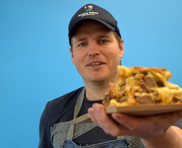 Hungry Hobos owner Romeo Dowling-Mitchell, of Mornington, and his Bat Out of Hell sandwich — a...