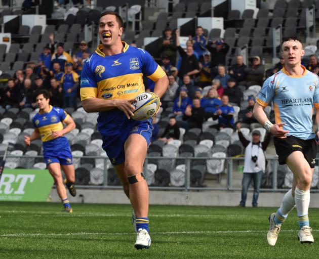Taieri run in a try during their 40-26 win over University A. Photo: Gregor Richardson 