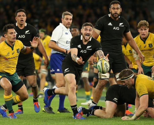 TJ Perenara clears the ball from a ruck during the All Blacks loss to Australia. Photo: Getty Images