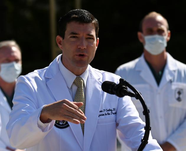 Dr Sean Conley, the White House physician, briefs media on Sunday. Photo: Reuters 