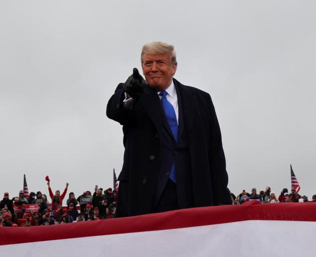 Donald Trump during a campaign rally at Capital Region International Airport in Lansing, Michigan...