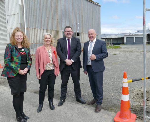 Finance Minister Grant Robertson pauses in Balclutha with (from left) Labour list candidate...